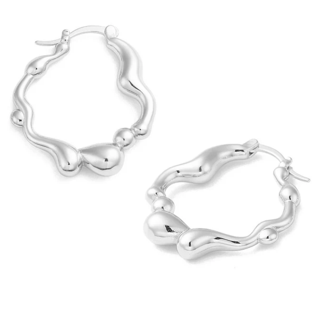 Boucles d'oreilles Creoles ondulees plaqué or