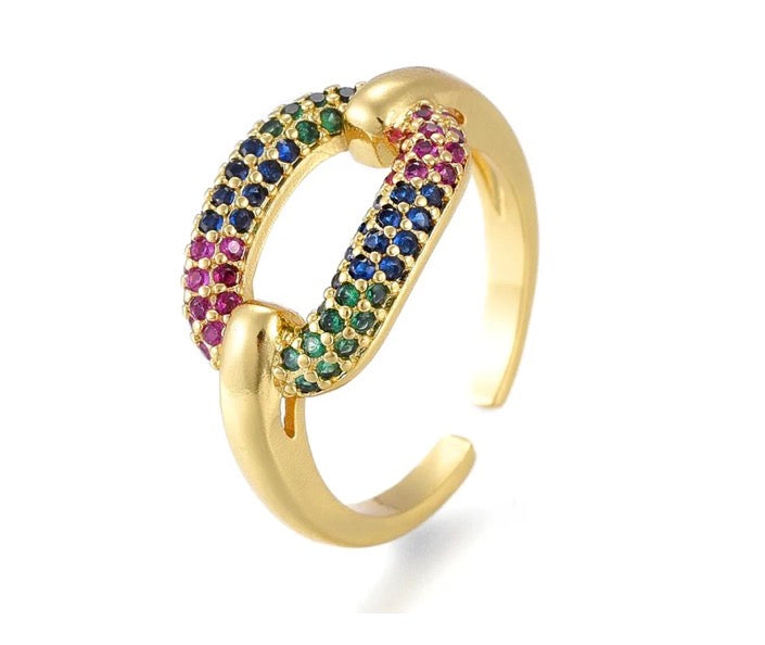 Bague dorée couronne zirconiums marquise violets