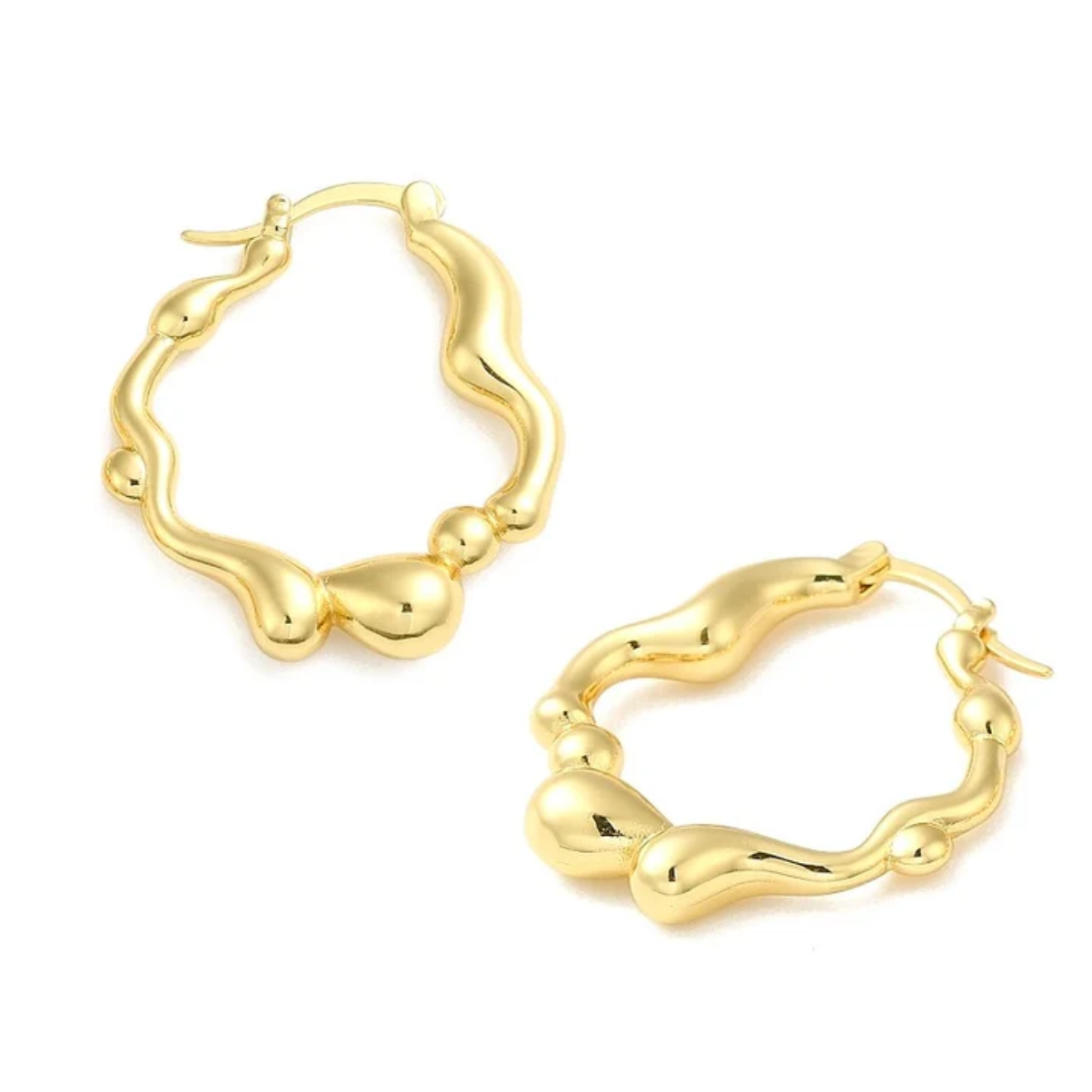 Boucles d'oreilles Creoles ondulees plaqué or