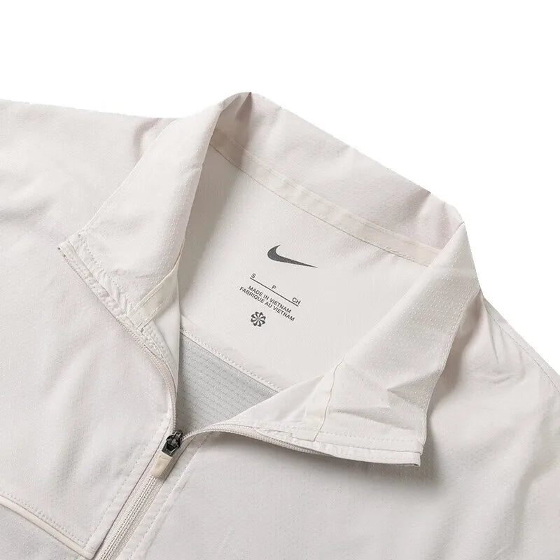 Veste Nike Femme Seasonal UV Dri-FIT – Running & Sport